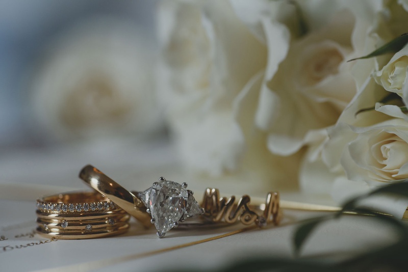 Heirloom Engagement Ring %26 "Mrs." Ring
Photography: LuxRox
Read More:
http://www.insideweddings.com/weddings/alfresco-inspired-luxurious-hotel-wedding-in-washington-dc/1312/ custom mrs gold ring with script and teardrop diamond engagement ring from mother of bride side late