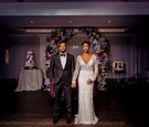 Couple in Front of Floral Display