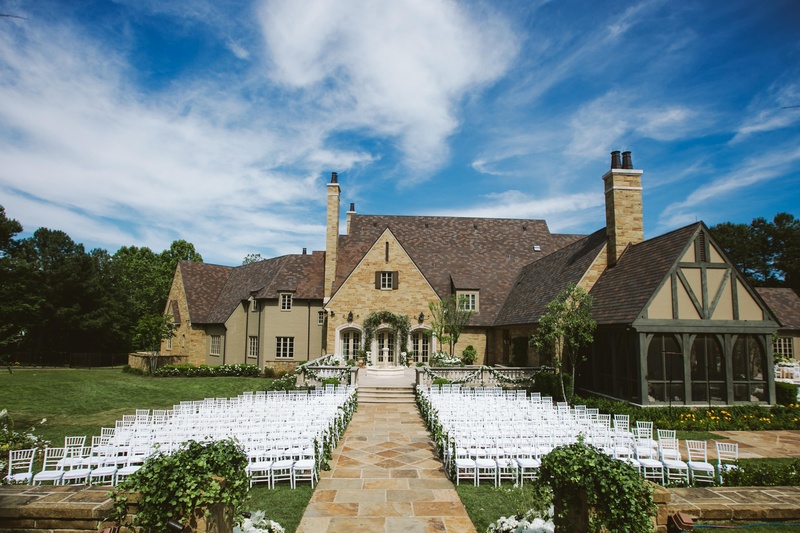 Backyard Ceremony Décor
Photography: David %26 Tammy Molnar
Read More:
http://www.insideweddings.com/weddings/an-exquisite-backyard-wedding-in-tennessee/532/ Outdoor wedding with white chairs and garlands