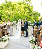 Guests Facing Altar in Washington, DC
Photography: Kurstin Roe Photography
Read More:
http://www.insideweddings.com/weddings/elegant-outdoor-ceremony-ballroom-reception-in-washington-dc/1169/ Wedding guests in wood chairs flower boxes stone aisle bride and groom woman officiant bridesmaids