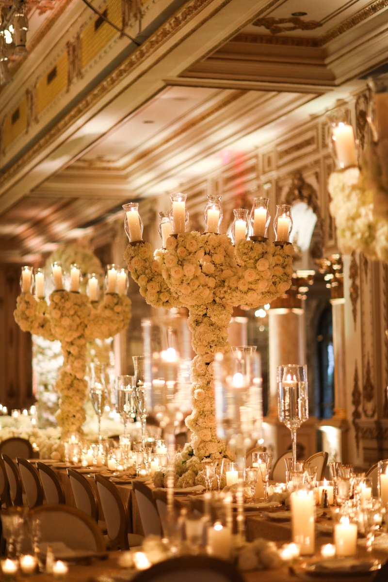 Rose-and-Hydrangea Candelabra
Photography: Alain Martinez Photography
Read More:
http://www.insideweddings.com/weddings/opulent-luxury-wedding-with-white-gold-color-scheme-in-palm-beach/1375/ oversized wedding flower centerpiece candelabra rose and hydrangea white gold decor candlelight