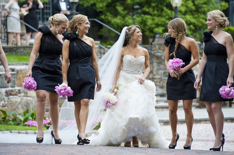 Short Black One-Shoulder Bridesmaid Dresses
Photography: Images by Berit, Inc.
Read More:
http://www.insideweddings.com/weddings/wedding-with-purple-modern-details-at-a-chateau-in-new-jersey/693/ Bridesmaids in one-shoulder Lynn Lugo black dresses, bride in strapless Lazaro gown, peony bouquets