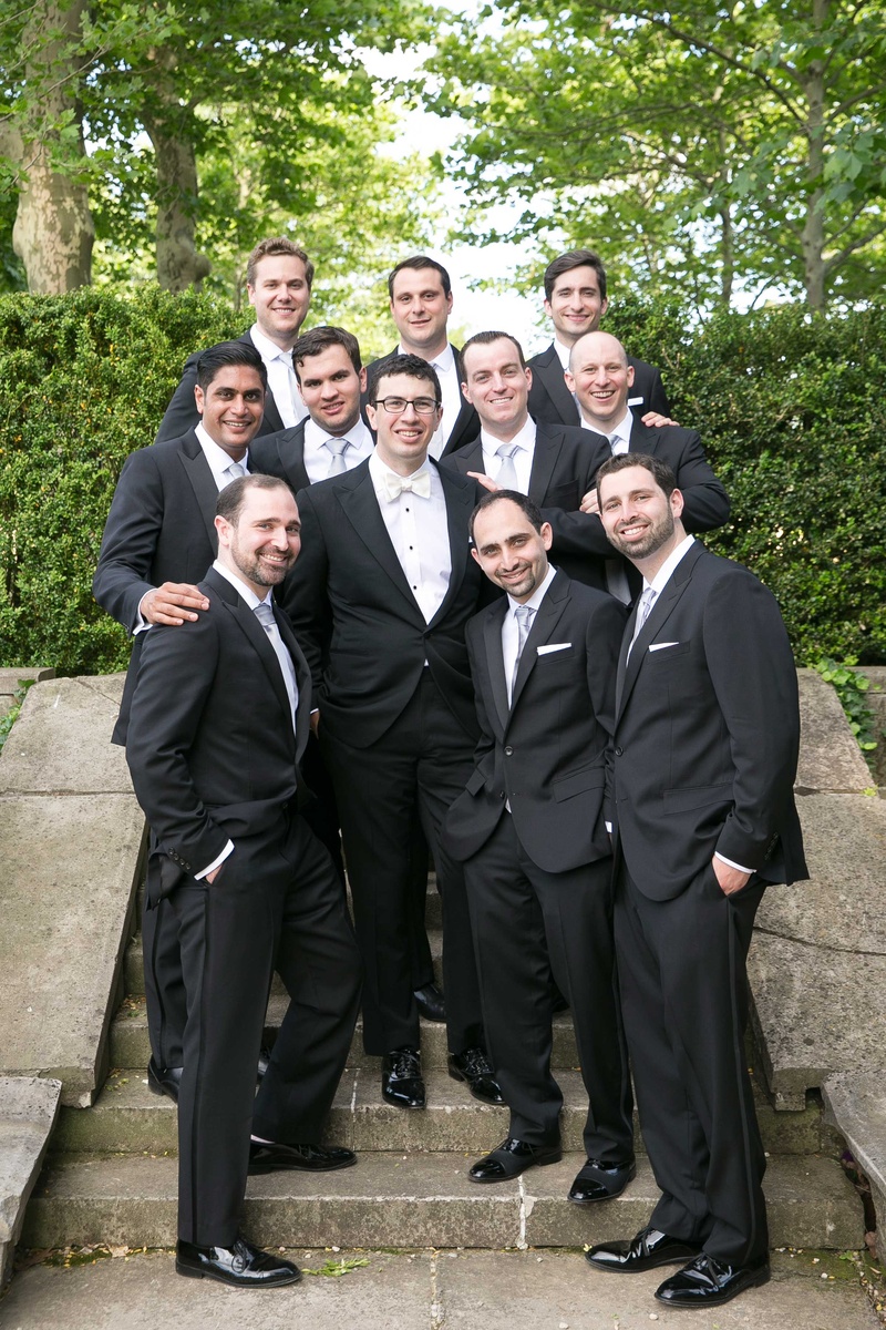 Tuxedoed Groomsmen with Silver Ties
Photography: Brett Matthews Photography
Read More:
http://www.insideweddings.com/weddings/regal-outdoor-ceremony-ballroom-reception-at-oheka-castle-in-ny/821/ Groom in tuxedo with white bow tie and groomsmen in tuxedos with silver ties