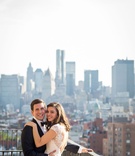 New York Wedding Portrait with Skyline
Photography: Josephine Photography
Read More:
http://www.insideweddings.com/weddings/traditional-jewish-ceremony-romantic-yellow-reception-in-nyc/1036/ Wedding couple in tuxedo and gown from Mark Ingram Atelier on rooftop balcony with view of city