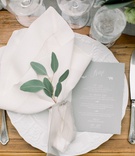 Grey Menu Card with White Script
Photography: Brett Hickman Photographers
Read More:
http://www.insideweddings.com/weddings/taylour-rutledge-and-shane-vereen/1276/ wedding reception wood table eucalyptus greenery in napkin sheer ribbon china grey menu card white