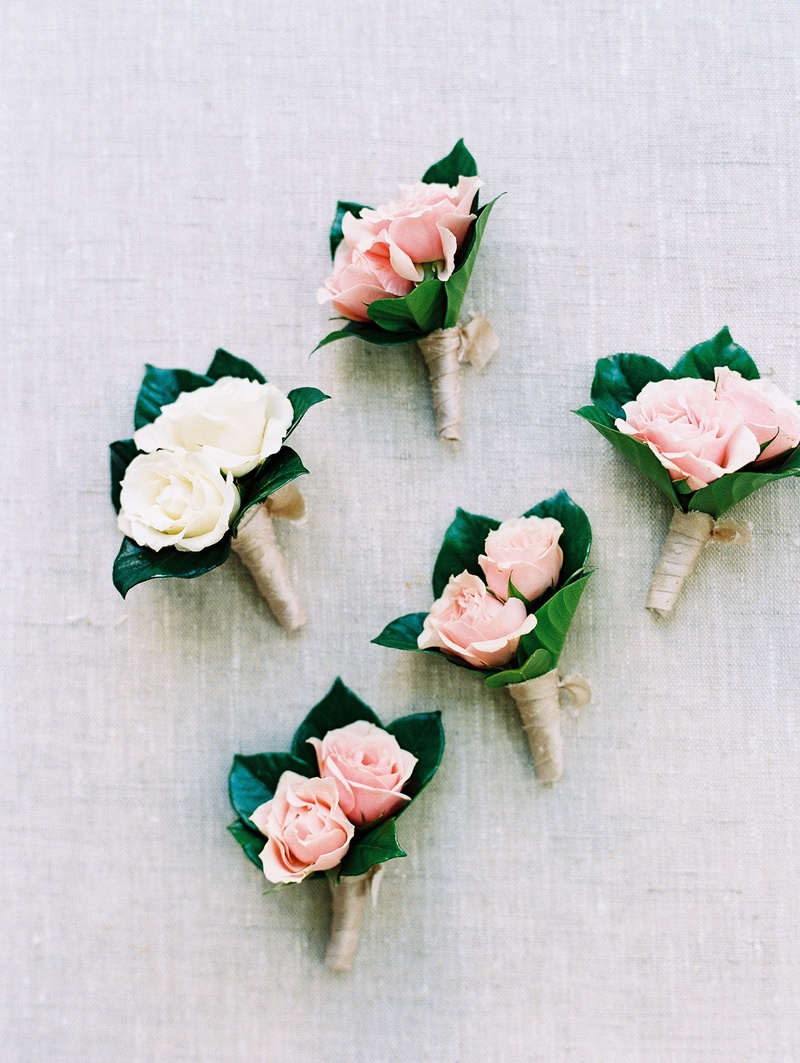 White %26 Pink Rose Boutonnieres
Photography: Bonnie Sen Photography
Read More:
http://www.insideweddings.com/weddings/outdoor-ceremony-tented-reception-by-a-tranquil-river-in-maryland/1088/ Groom white two flower boutonniere and groomsmen pink boutonnieres two flowers roses