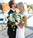 Groom Kisses Bride on Forehead
Photography: Vue Photography
Read More:
http://www.insideweddings.com/weddings/snowy-winter-wedding-at-the-grooms-family-home-in-south-carolina/969/ groom in brooks brothers tuxedo kisses bride on forehead, loosely structured bouquet