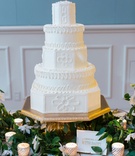 White Wedding Cake on Gold Stand
Photography: Liz Banfield
Read More:
http://www.insideweddings.com/weddings/sophisticated-playful-southern-jewish-wedding-in-charleston/1076/ Wedding reception stand cake on gold stand white cake greenery candle votive wedding cake with dairy