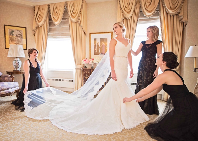 Bridesmaids and Mother of the Bride Help with Veil
Photography: Carasco Photography
Read More:
http://www.insideweddings.com/weddings/new-york-yankees-infielder-marries-in-opulent-chicago-soiree/764/ mother of the bride and bridesmaids help bride with her nelphi veil and matthew christopher gown