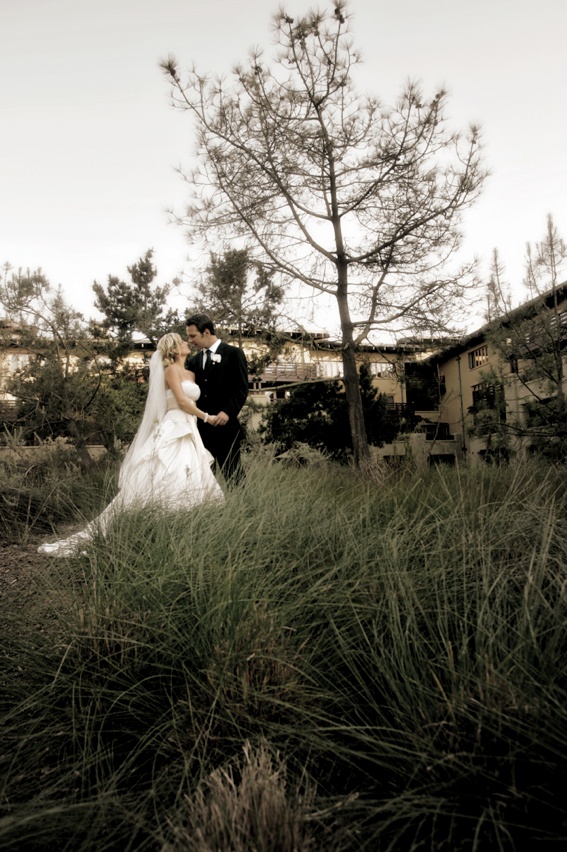 The Lodge at Torrey Pines Couple
Photography: Ventana Photography
Read More:
http://www.insideweddings.com/weddings/black-and-red-wedding-on-golf-course-at-the-lodge-at-torrey-pines/122/ Bride in pick up skirt and groom in field at La Jolla's The Lodge at Torrey Pines