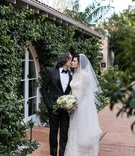 Bride %26 Groom at Bel-Air Venue
Photography: Samuel Lippke Studios
Read More:
http://www.insideweddings.com/weddings/glamorous-alfresco-ceremony-ballroom-reception-and-after-party/1041/ Wedding portrait bride in veil and long sleeve wedding dress groom tuxedo bow tie kisses cheek
