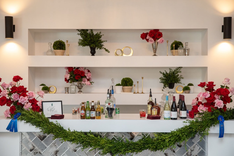 Blue Ribbon Bar
Photography: Collin Pierson Photography
Read More:
http://www.insideweddings.com/weddings/equestrian-themed-bridal-shower-inspired-by-the-kentucky-derby/1326/ kentucky derby themed bridal shower, bar with garland held by blue ribbons, red and pink roses