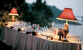 Lampshade Cocktail Bar
Photography: Jessica Claire Photography
Read More:
http://www.insideweddings.com/weddings/sentimental-ceremony-tented-reception-in-maryland/203/ drinks served on table decorated with red lampshades