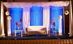 Sweetheart Stage
Photography: Kim Fox Photography
Read More:
http://www.insideweddings.com/weddings/colorful-indian-summer-wedding-at-a-golf-course/449/ Indian wedding reception loveseat for couple
