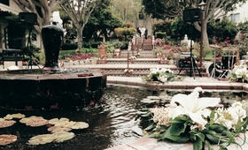 Mediterranean-Inspired Courtyard
Photography: Max Shaboot Photography
Read More:
http://www.insideweddings.com/weddings/alfresco-spring-wedding-in-malibu-california/31/ Serra retreat courtyard fountain