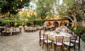 Courtyard Reception
Photography: Apertura
Read More:
http://www.insideweddings.com/weddings/warm-inviting-outdoor-fall-wedding-with-romantic-rustic-details/1363/ outdoor wedding reception at hummingbird nest ranch, courtyard reception, bistro lights