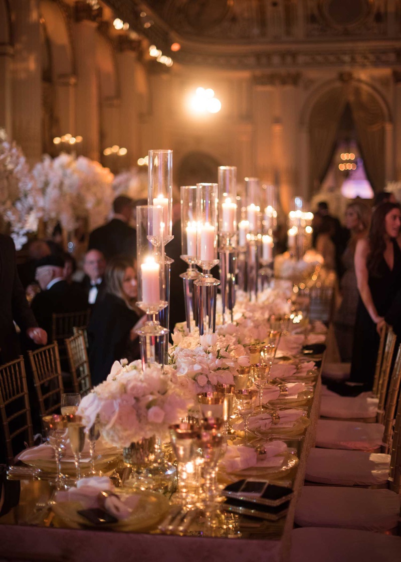 Tall Candles %26 Low Floral Centerpieces
Photography: The Day by Ira Lippke
Read More:
http://www.insideweddings.com/weddings/opulent-luxury-wedding-with-timeless-color-palette-in-new-york-city/1199/ wedding reception long rectangle table mirror top low flower centerpiece tall candles candlelight
