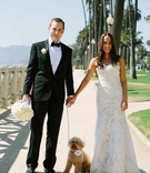 Bride %26 Groom Walk Their Dog at the Beach
Photography: Yvette Roman Photography
Read More:
http://www.insideweddings.com/weddings/all-white-wedding-at-a-beach-club-in-santa-monica-california/706/ Groom in a black tuxedo, bride in an Alencon lace dress with dog wearing a white flower on collar