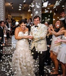 Flower Petal Exit
Photography: Denis Reggie Photographers
Read More:
http://www.insideweddings.com/weddings/lavish-white-gold-country-club-wedding-in-houston-texas/416/ Guests toss white rose petals at bride and groom