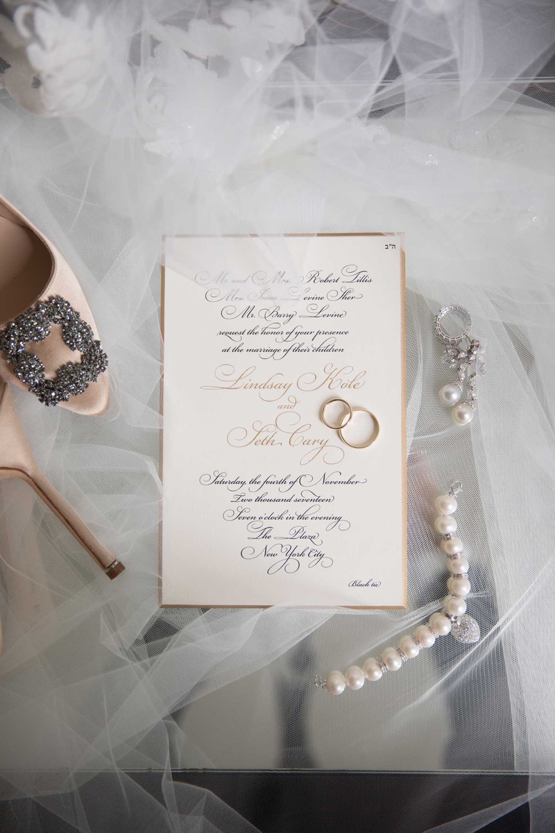 Wedding Rings on Gold Invitation
Photography: The Day by Ira Lippke
Read More:
http://www.insideweddings.com/weddings/opulent-luxury-wedding-with-timeless-color-palette-in-new-york-city/1199/ wedding invitation formal black tie gold black calligraphy gold morder pearls earrings wedding rings