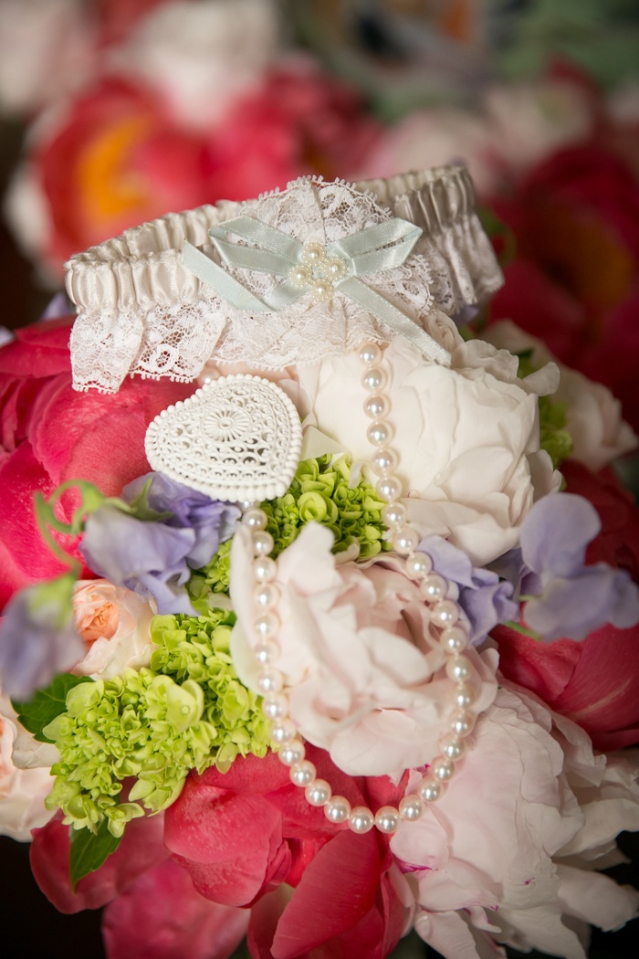 Lace and Pearl Bridal Garter
Photography: Karlisch Photography
Read More:
http://www.insideweddings.com/weddings/southern-wedding-with-pink-color-palette-sentimental-details/976/ lace pearl bridal garter heart southern wedding tradition pretty feminine lingerie