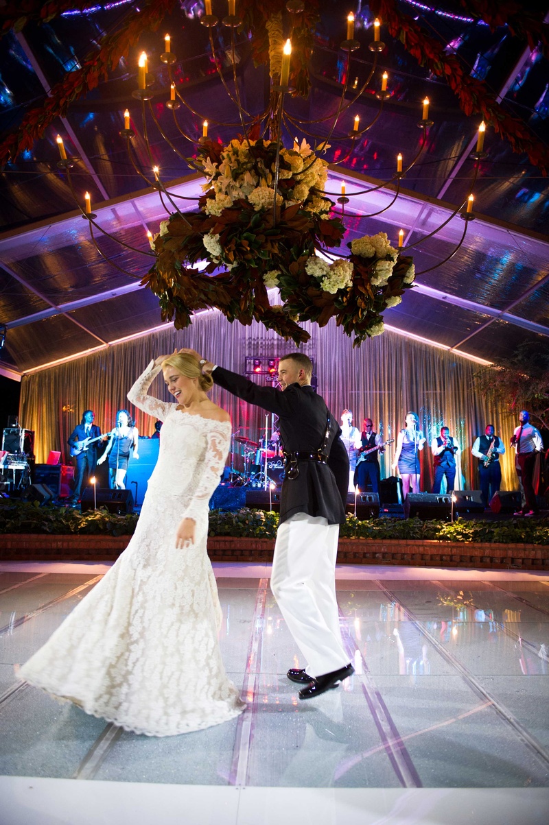 Dance Floor Over At-Home Swimming Pool
Photography: Chris Bailey Photography
Read More:
http://www.insideweddings.com/weddings/southern-at-home-wedding-inspired-by-father-of-the-bride-in-texas/753/ Chandelier over lighted acrylic dance floor at private home wedding with wedding band first dance