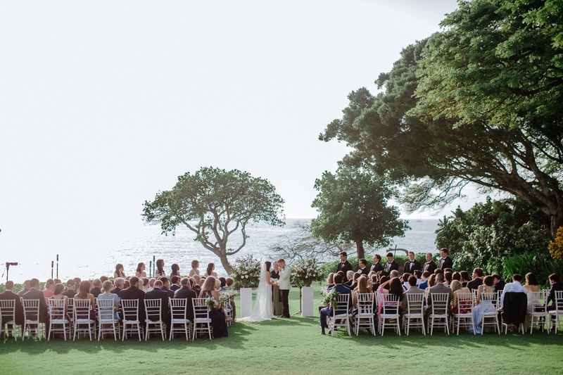 Waimea, Hawaii Wedding Ceremony
Photography: Chris J. Evans Photography
Read More:
http://www.insideweddings.com/weddings/outdoor-winter-ceremony-and-reception-on-the-big-island-in-hawaii/1306/ outdoor destination wedding ceremony in waimea hawaii white chairs greenery ocean backdrop trees