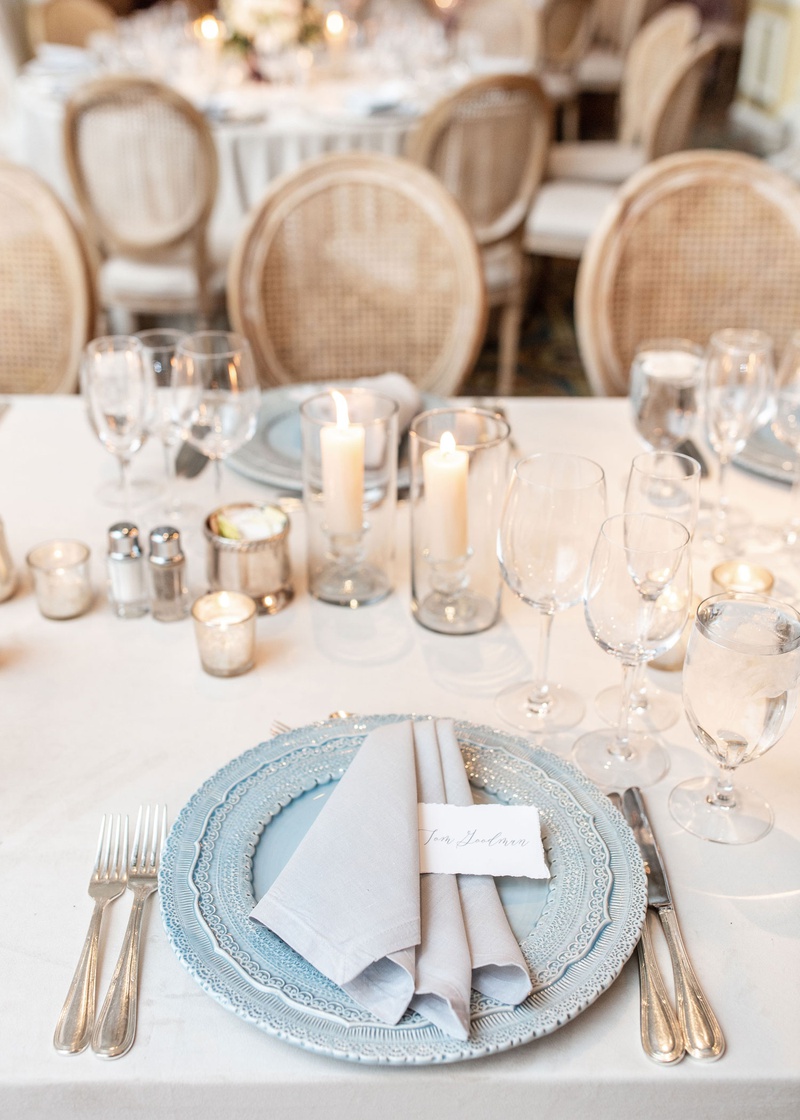 French Wedding Reception Place Setting
Photography: Mantas Kubilinskas Photography
Read More:
http://www.insideweddings.com/weddings/sophisticated-ceremony-ballroom-reception-in-washington-dc/1296/ wedding reception place setting light blue charger plate grey napkin place card candles cane chair