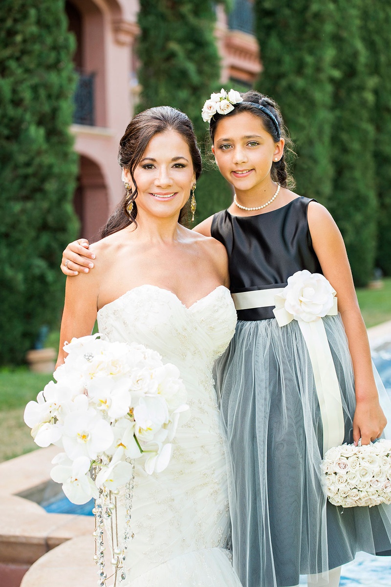Bride and Her Daughter as Flower Girl
Photography: Boyd Harris Photographs
Read More:
http://www.insideweddings.com/weddings/a-jeweled-floral-wedding-at-fairmont-grand-del-mar-in-san-diego/745/ bride in strapless Romona Keveza wedding dress with flower girl in black and blue dress