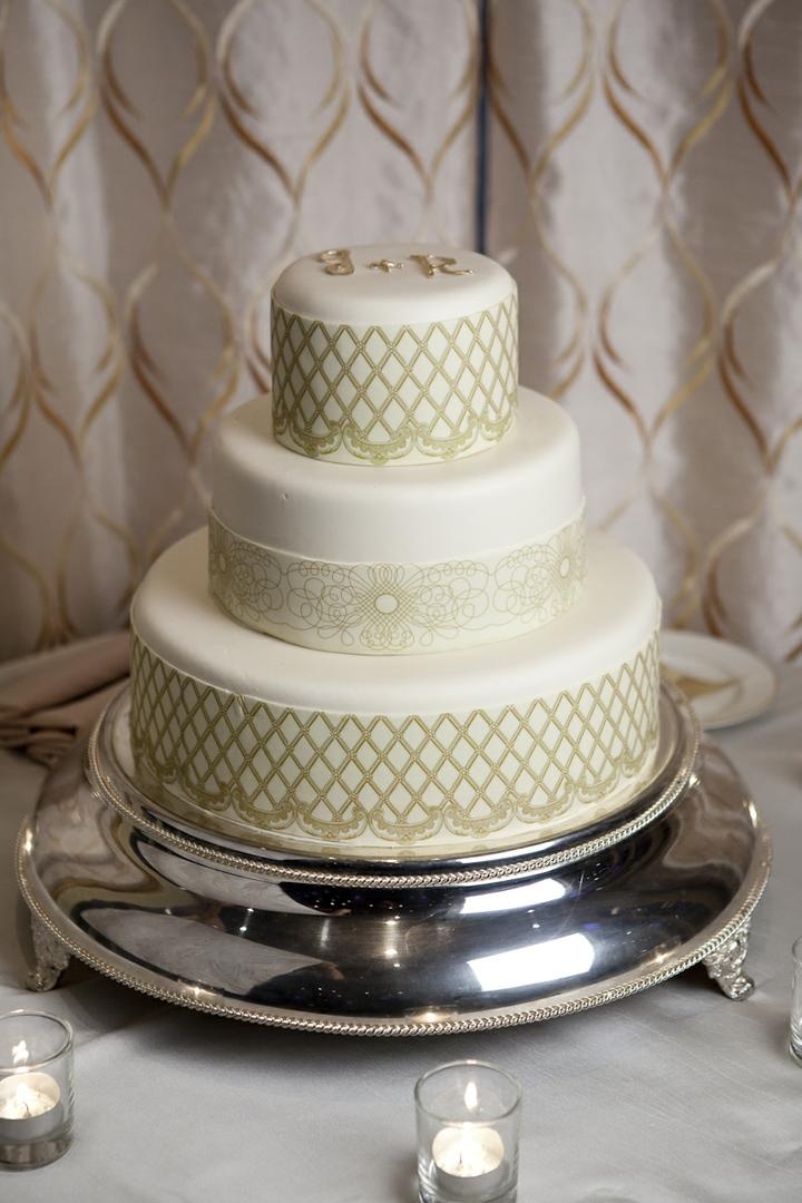 White Chocolate Cake
Photography: Catherine Hall Studios
Read More:
http://www.insideweddings.com/weddings/metropolitan-san-francisco-wedding-at-luxury-hotel/411/ Three layer wedding cake with gold initials