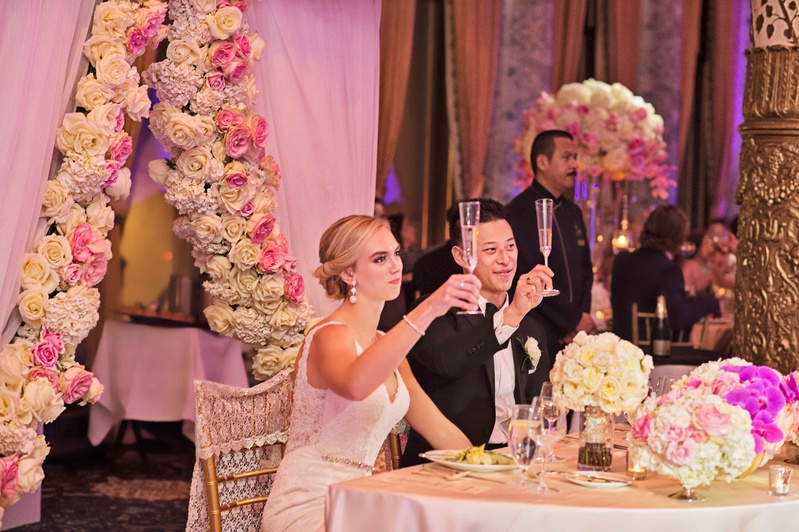 Champagne Toast in Flower-Filled Room
Photography: Carasco Photography
Read More:
http://www.insideweddings.com/weddings/new-york-yankees-infielder-marries-in-opulent-chicago-soiree/764/ rob refsnyder of new york yankees and wife raise glasses for champagne toast