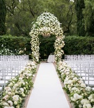 Ceremony Aisle %26 Chuppah Covered with Flowers
Photography: Samuel Lippke Studios
Read More:
http://www.insideweddings.com/weddings/outdoor-jewish-wedding-ceremony-glam-reception-in-beverly-hills/848/ Wedding ceremony at The Beverly Hills Hotel white rose hydrangea flowers chuppah aisle runner