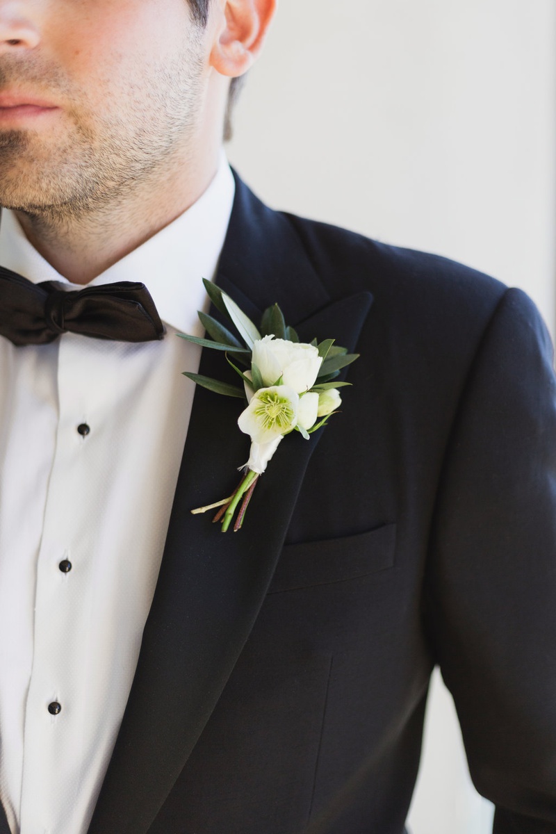 White Flowers with Dark Greenery
Photography: Marissa Maharaj
Read More:
http://www.insideweddings.com/weddings/destination-wedding-in-maui-with-both-classic-and-tropical-touches/1248/ groom boutonniere with white flowers with dark green leaves