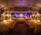 Reception with White Tablescapes and Purple Lighting