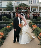 Bride and Groom at Ceremony
Photography: Jay Lawrence Goldman Photography
Read More:
http://www.insideweddings.com/weddings/a-sophisticated-tented-estate-wedding-in-california/179/ Bride in a strapless gown with a pickup skirt and groom in black tuxedo