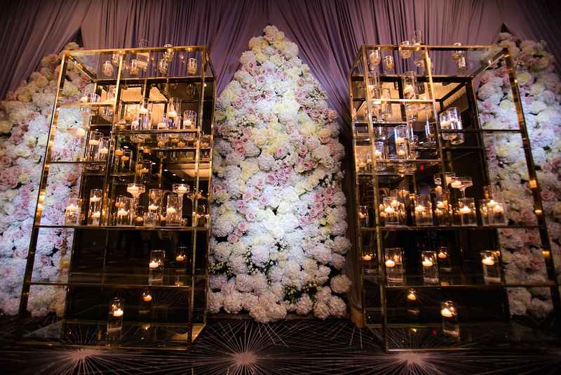 Stunning Flower Panels %26 Stands of Candles
Photography: Gold Grid Studios
Read More:
http://www.insideweddings.com/weddings/celebratory-wedding-shoot-with-elegant-romantic-decor-in-chicago/728/ Wedding reception with a modern mirrored metal stands, candles, floral panels of white hydrangeas