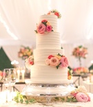 Fresh Flowers on Four-Tiered Cake
Photography: Angel Canary Photography
Read More:
http://www.insideweddings.com/weddings/alfresco-garden-ceremony-tented-reception-with-vibrant-florals/1027/ four-tiered wedding cake with horizontal frosting layers and fresh flowers