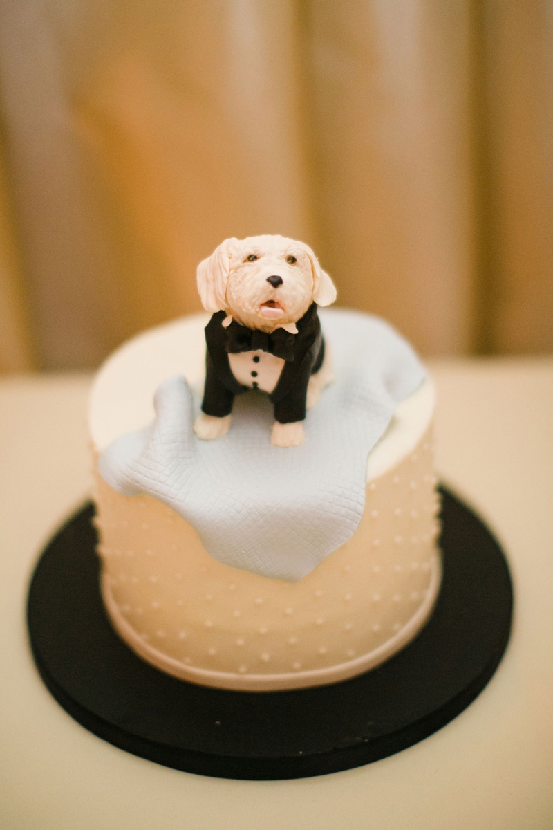 Small Groom's Cake with Dog in Tux
Photography: Michelle Beller Photography
Read More:
http://www.insideweddings.com/weddings/classic-ceremony-beachfront-ballroom-reception-in-santa-monica/1234/ small groom's cake surprise swiss dot design topper designed to look like dog in tuxedo blue blanket