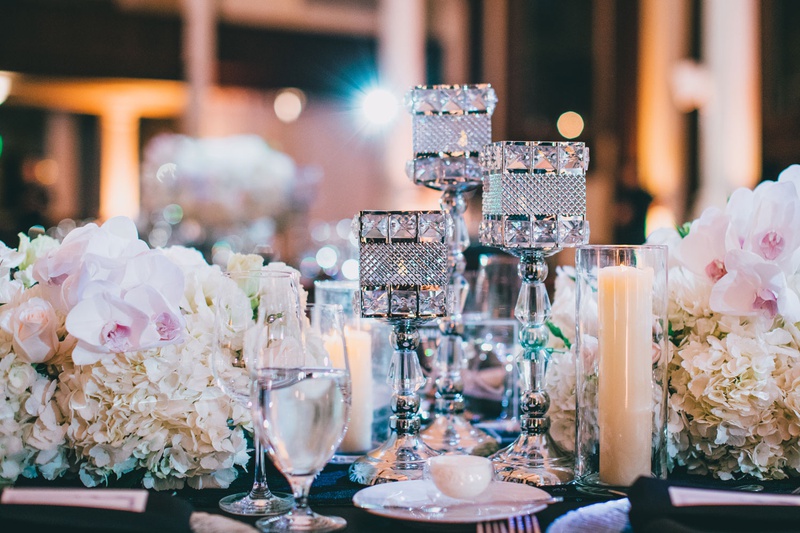 Rhinestone %26 Crystal Candlesticks
Photography: Jimmy Bui Photography
Read More:
http://www.insideweddings.com/weddings/elegant-edgy-wedding-inspired-by-disney-at-vibiana-in-downtown-la/1229/ wedding reception hydrangea orchid candlesticks with crystal details pillar candles in glass