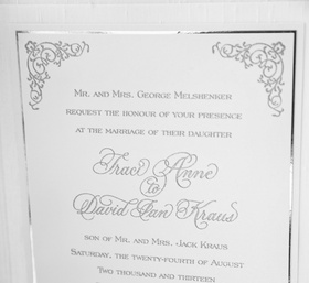 Metallic Wedding Invitation
Photography: KingenSmith
Read More:
http://www.insideweddings.com/weddings/opulent-chicago-wedding-with-elaborate-decor-entertainment/545/ White paper invites with silver calligraphy and motif