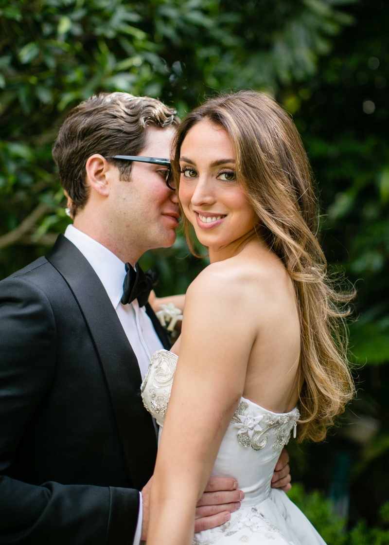 Beverly Hills Couple Portrait
Photography: Samuel Lippke Studios
Read More:
http://www.insideweddings.com/weddings/romantic-jewish-wedding-with-lush-ivory-flowers-rose-gold-details/790/ Groom in Tom Ford tuxedo bow tie glasses holds bride in strapless Oscar de la Renta wedding dress