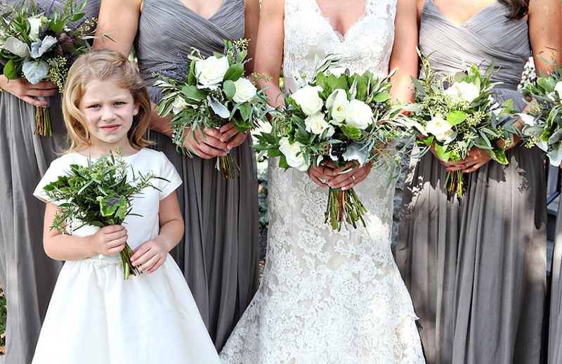 Rustic Bridal Party Bouquets
Photography: Stacy Newgent
Read More:
http://www.insideweddings.com/weddings/rustic-barn-wedding-tented-reception-on-family-farm-in-ohio/690/ Grey bridesmaid dresses and flower girl with rustic green and white bouquets