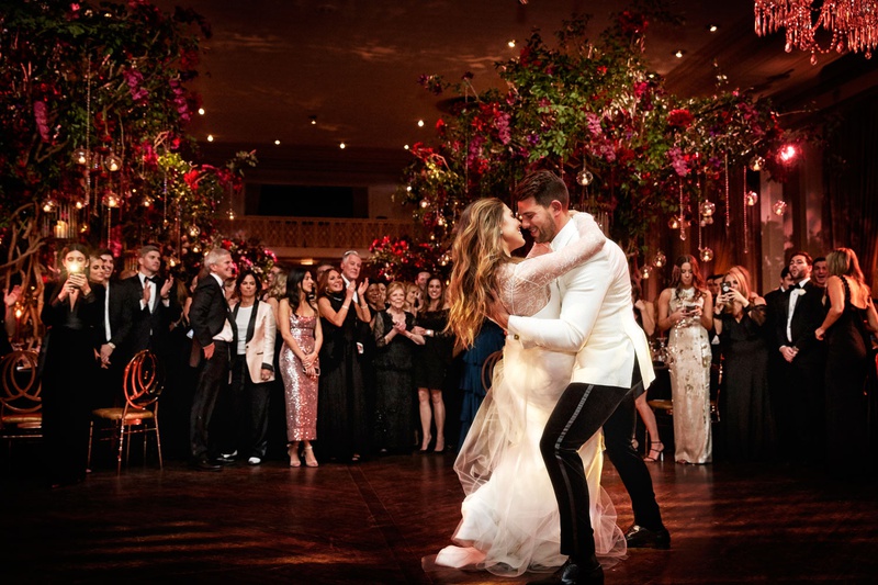 Romantic First Dance Photo
Photography: KingenSmith
Read More:
http://www.insideweddings.com/weddings/luxurious-wedding-featuring-sentimental-butterfly-decor-in-chicago/1348/ bride in vera wang wedding dress groom in white jacket first dance beautiful photo dip guests watch