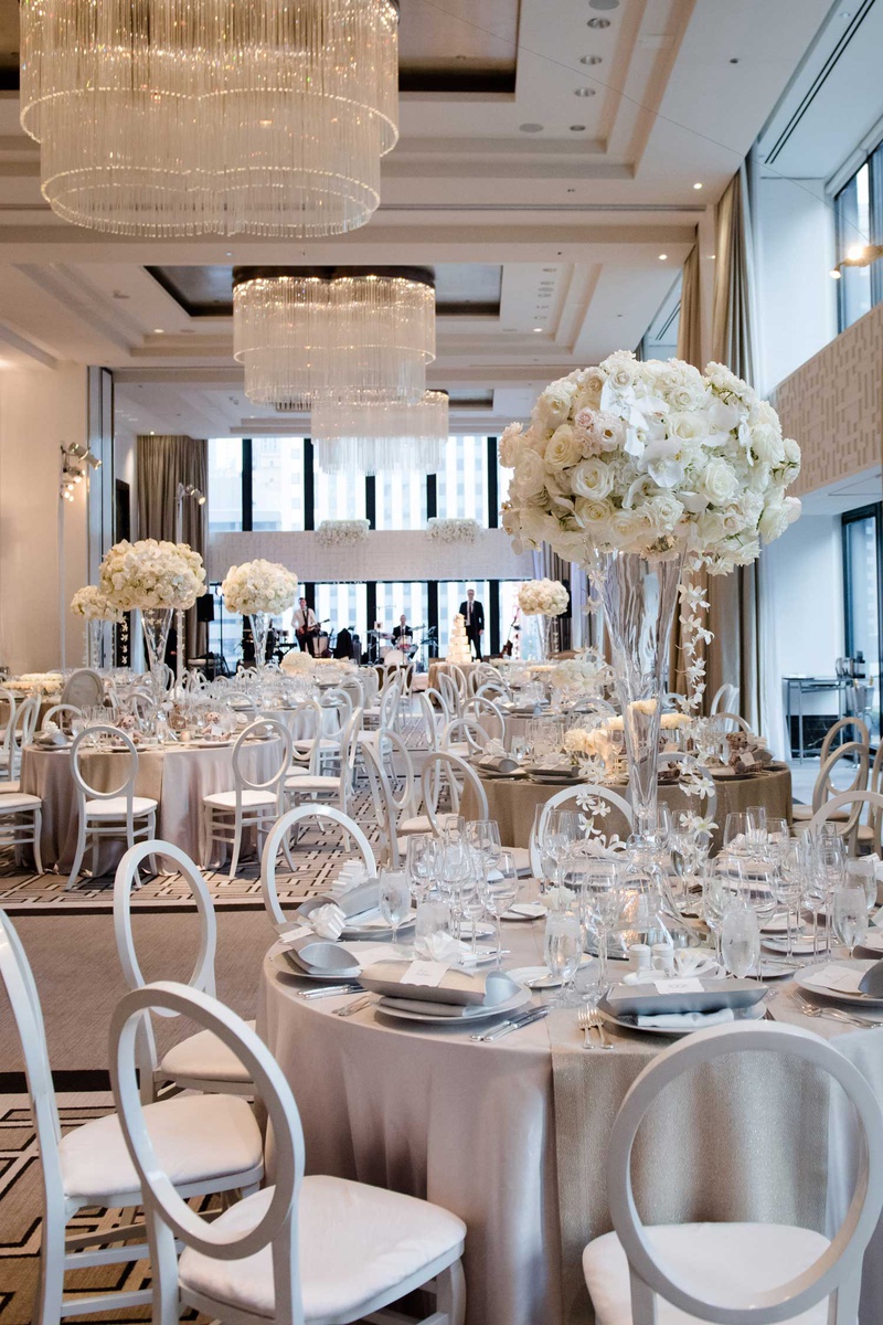 CIty-Style White %26 Grey Reception
Photography: Studio This Is
Read More:
http://www.insideweddings.com/weddings/glamorous-city-style-real-wedding-at-a-luxury-hotel-in-chicago/1217/ wedding reception decor chicago ballroom the langham light grey silver linens white flowers