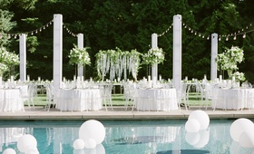 Poolside Reception
Photography: Simply Splendid
Read More:
http://www.insideweddings.com/weddings/los-angeles-rams-nfl-player-brandin-cooks-backyard-wedding/1281/ brandin cooks wedding, outdoor reception set up next to pool with large matte balloons