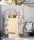 Floral Entrance to Reception
Photography: Brian Leahy Photography
Read More:
http://www.insideweddings.com/weddings/alfresco-ceremony-with-sweeping-ocean-views-tented-reception/1112/ floral archway entrance to wedding reception, blush and ivory roses