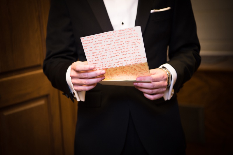 Groom Reads Letter
Photography: Carasco Photography
Read More:
http://www.insideweddings.com/weddings/jewish-wedding-with-classic-ivory-and-gold-decor-in-chicago/983/ groom in bonobos tux reads handwritten letter from bride