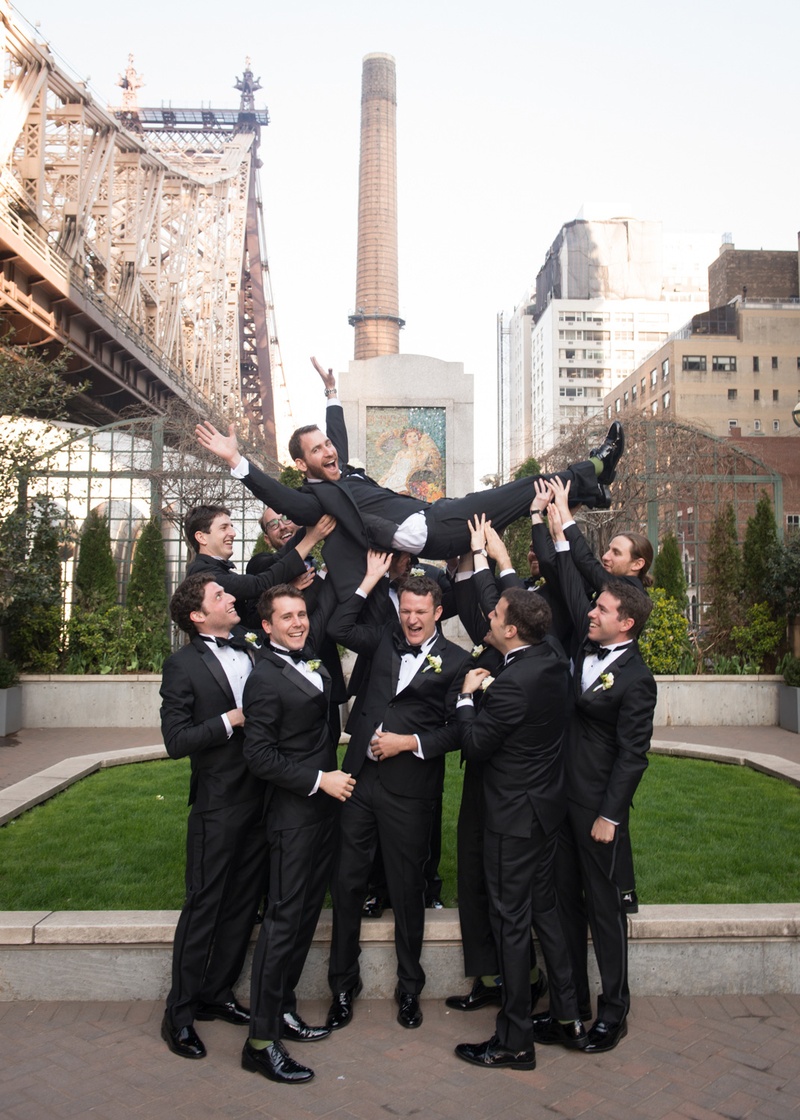 Groomsmen Lift Groom Up
Photography: Ira Lippke Studios
Read More:
http://www.insideweddings.com/weddings/chic-classic-new-york-city-wedding-with-personal-touches/783/ groomsmen sporting black tuxedos playfully lift the groom above their heads in NYC