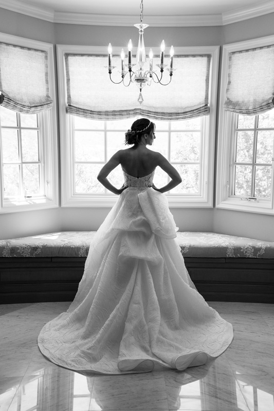 Strapless Monique Lhuillier Ball Gown Dress
Photography: Jay Lawrence Goldman Photography
Read More:
http://www.insideweddings.com/weddings/elegant-white-lavender-ballroom-wedding-with-cherry-blossom-trees/710/ Black and white picture of back of Monique Lhuillier wedding dress