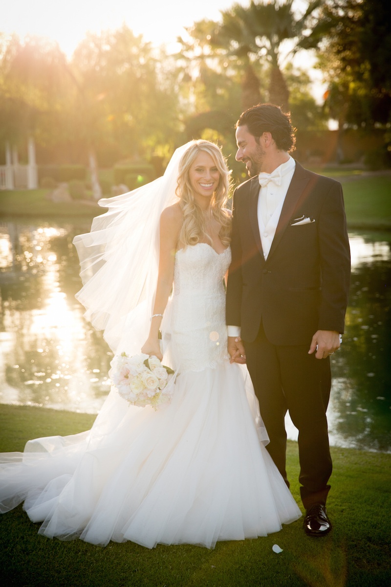 Couple Portrait at Sunset
Photography: Michael Segal Photography
Read More:
http://www.insideweddings.com/weddings/poolside-ceremony-amazing-open-air-tented-reception-in-california/641/ Bride and groom standing next to lake holding hands
